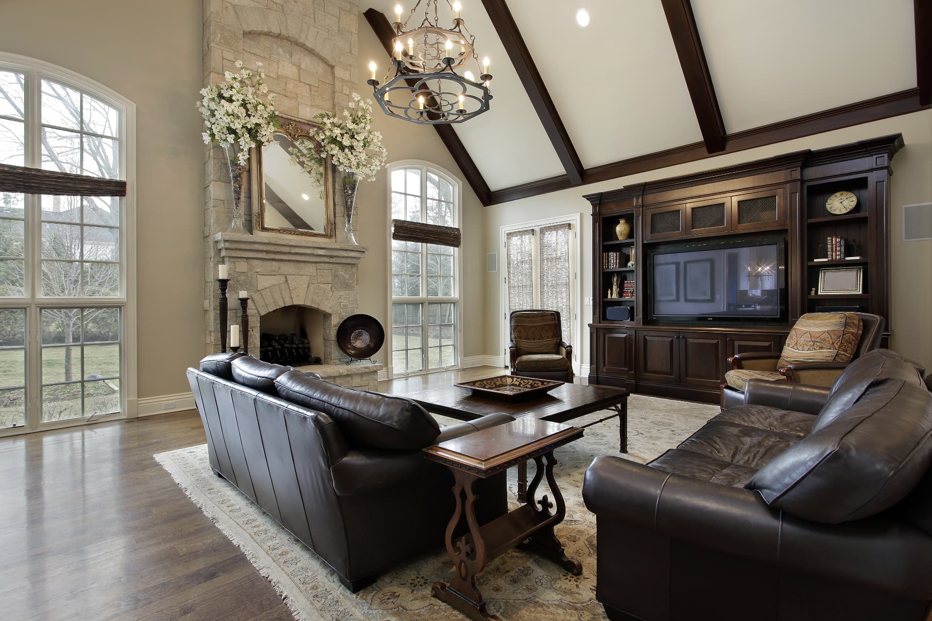 Family room with exposed wood ceiling beams and custom built-in cabinetry, Sioux Falls South Dakota
