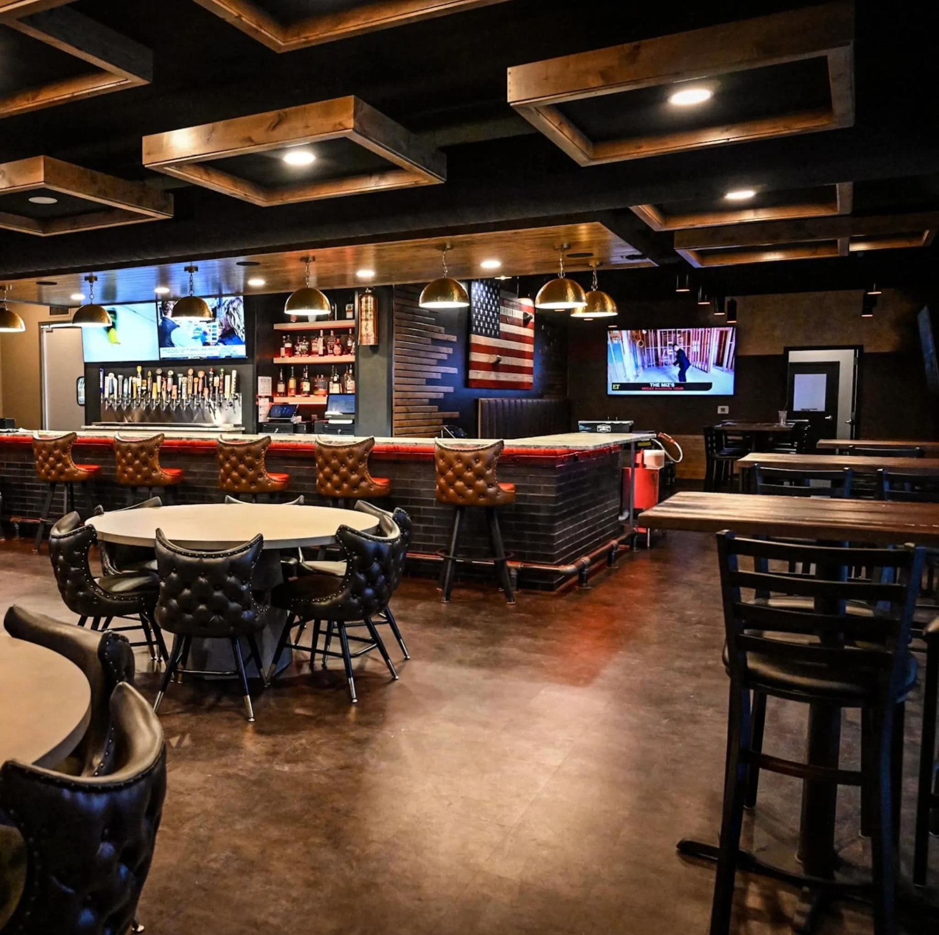 Custom coffered wood ceiling and full commercial interior buildout by Qualified Carpentry at Hook and Ladder Kitchen and Bar Sioux Falls South Dakota